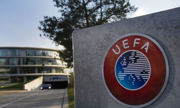 epa05246659 The UEFA logo is pictured next to the entrance of the UEFA Headquarters, in Nyon, Switzerland, 06 April 2016. Swiss federal police raided UEFA offices in Nyon in relation to TV contract details leaked in the Panama Papers. Leaked documents published on 03 April 2016 suggest that 140 politicians and officials from around the globe, including 72 former and current world leaders, have connections with secret 'offshore' companies to escape tax scrutiny in their countries.  EPA/JEAN-CHRISTOPHE BOTT